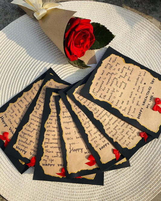 Set of Valentine's Day cards with red roses on a textured surface